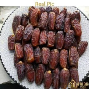 Indulge in the exquisite world of Mabroom Khajoor – premium, imported, and irresistibly delicious dates from Saudi Arabia. Enjoy the unique flavor and soft chewy texture of these dark brown glossy treats. Elevate your snacking experience with the best price Mabroom Dates in Pakistan. Shop online now for a taste of Al Madinah Al Munawwarrah’s holy date, known for its sweet raisin-like texture. Discover the favorite choice of date lovers worldwide – Mabroom Khajoor!"